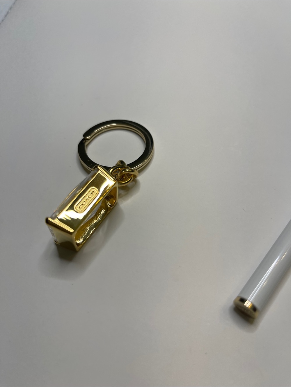 Coach Gold Rectangular Crystal Keychain with White Coach Pen - Picture 5 of 8
